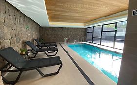 Depto a pasos de la playa, piscina, jacuzzi y patio